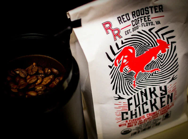 Red Rooster Organic Funky Chicken coffee bag with red rooster graphic and roasted coffee beans.