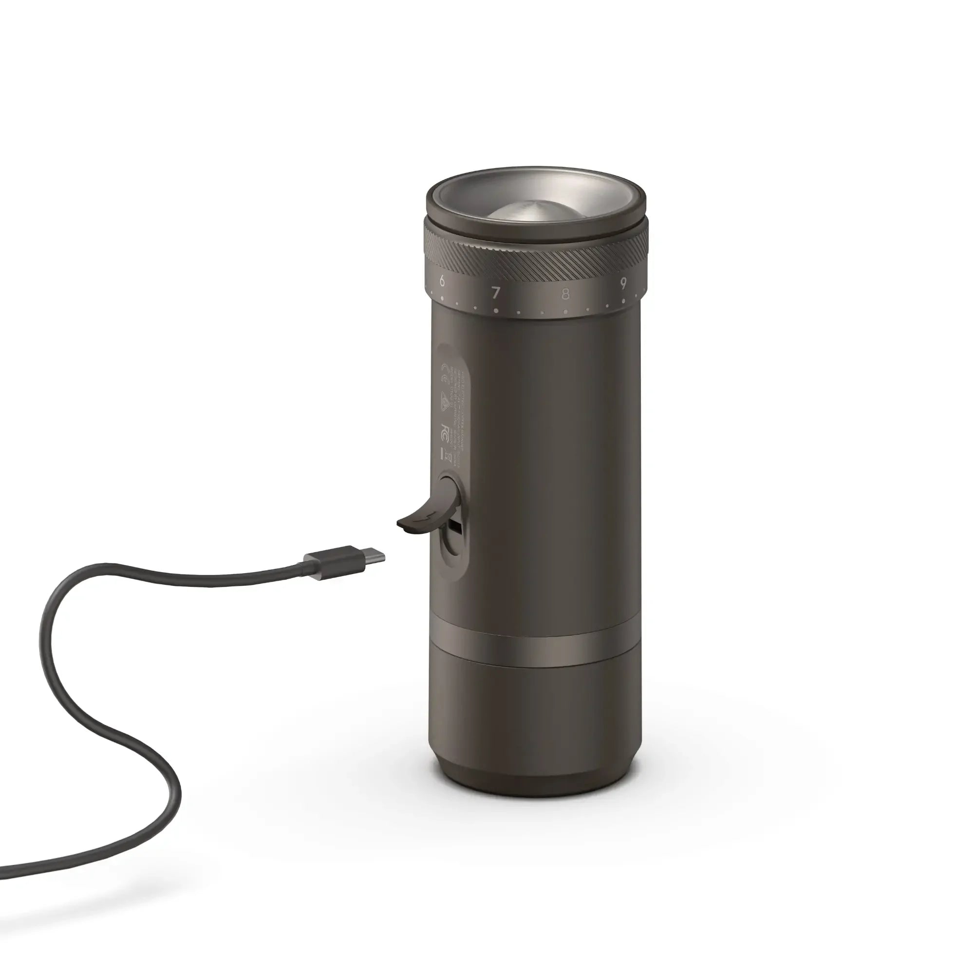Dark grey OutIn Fino coffee grinder charging via USB-C, highlighting fast-charge and grind setting.