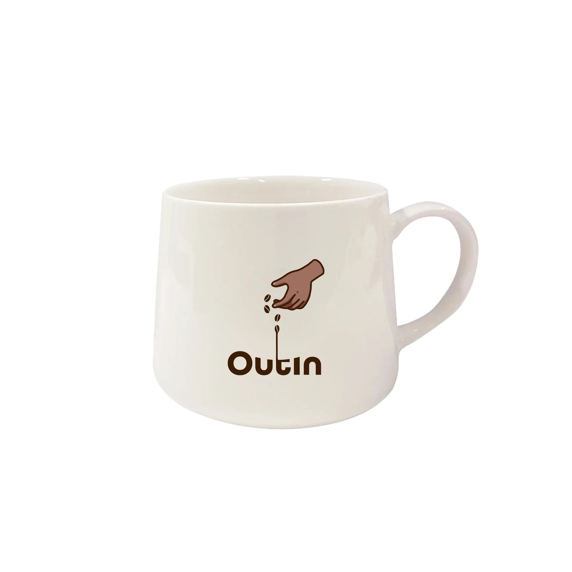 White ceramic OutIn portable espresso mug featuring a brown graphic of a hand dropping coffee beans above the brand name.