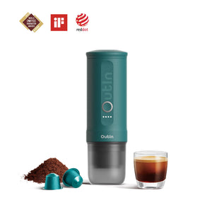 OutIn Nano Portable Espresso Machine in teal, with coffee grounds, capsules, and a shot of espresso on a white background.