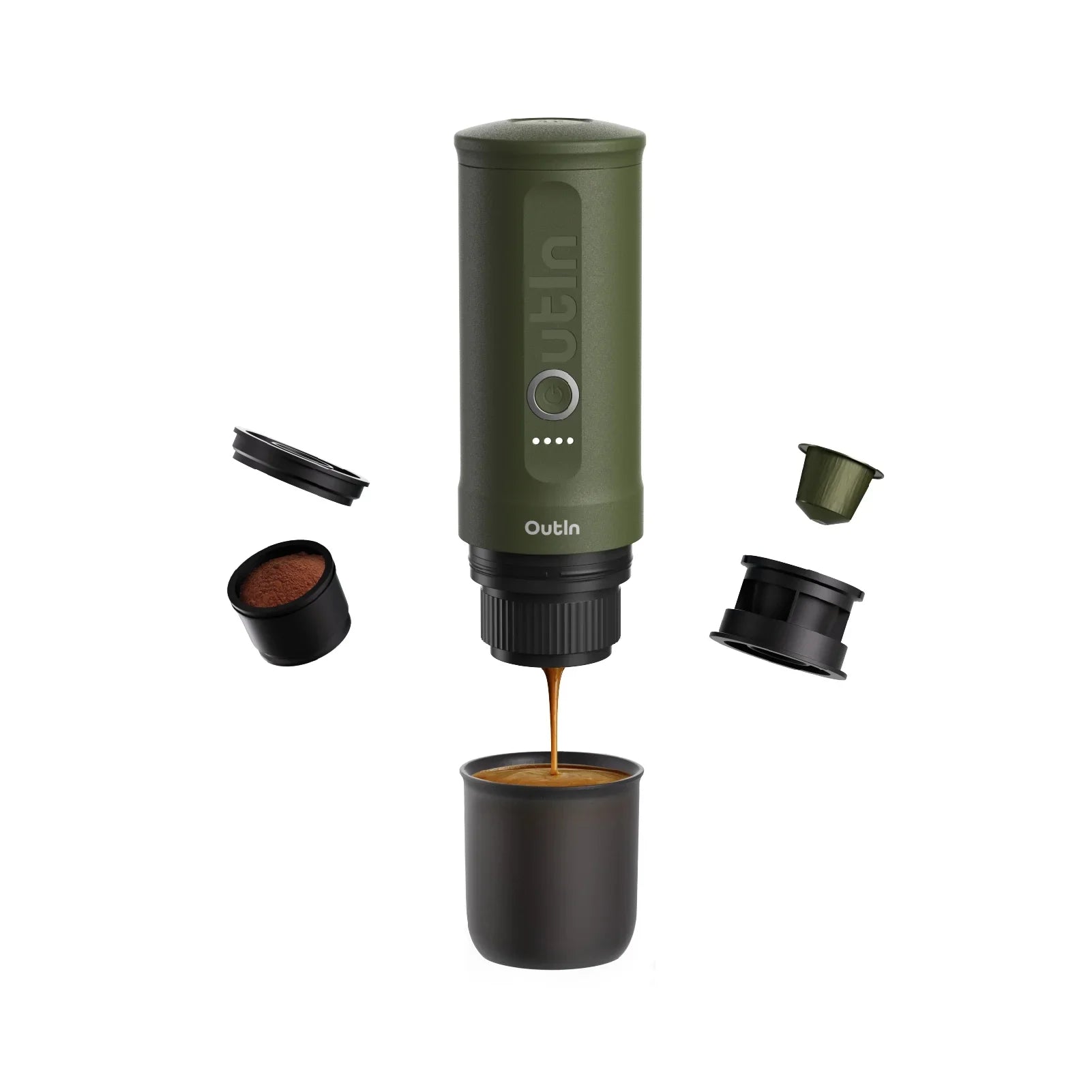 Forest green Nano portable espresso machine brewing espresso into a cup with coffee grounds and capsule shown.