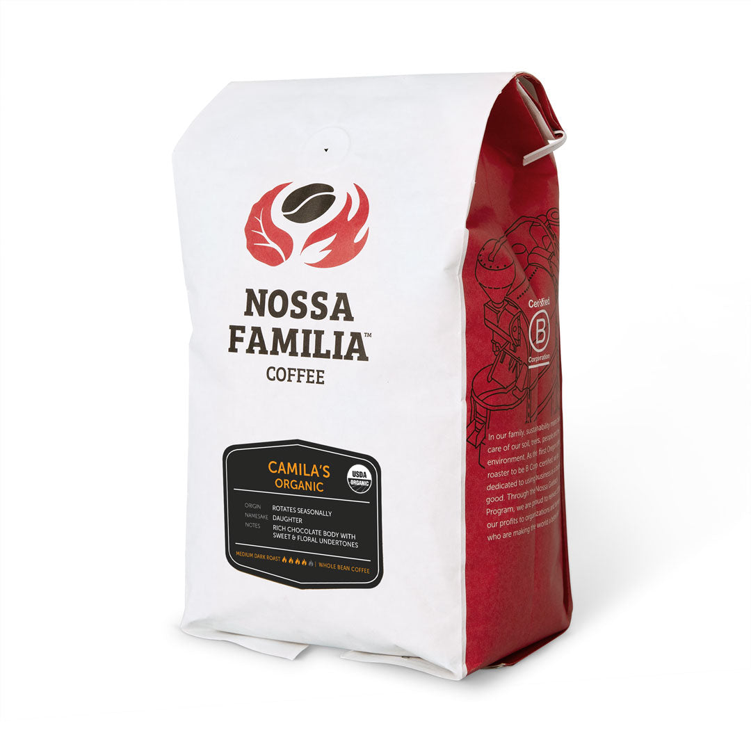 Nossa Familia Camila's Organic medium-dark roast whole bean coffee bag, chocolate and floral notes.