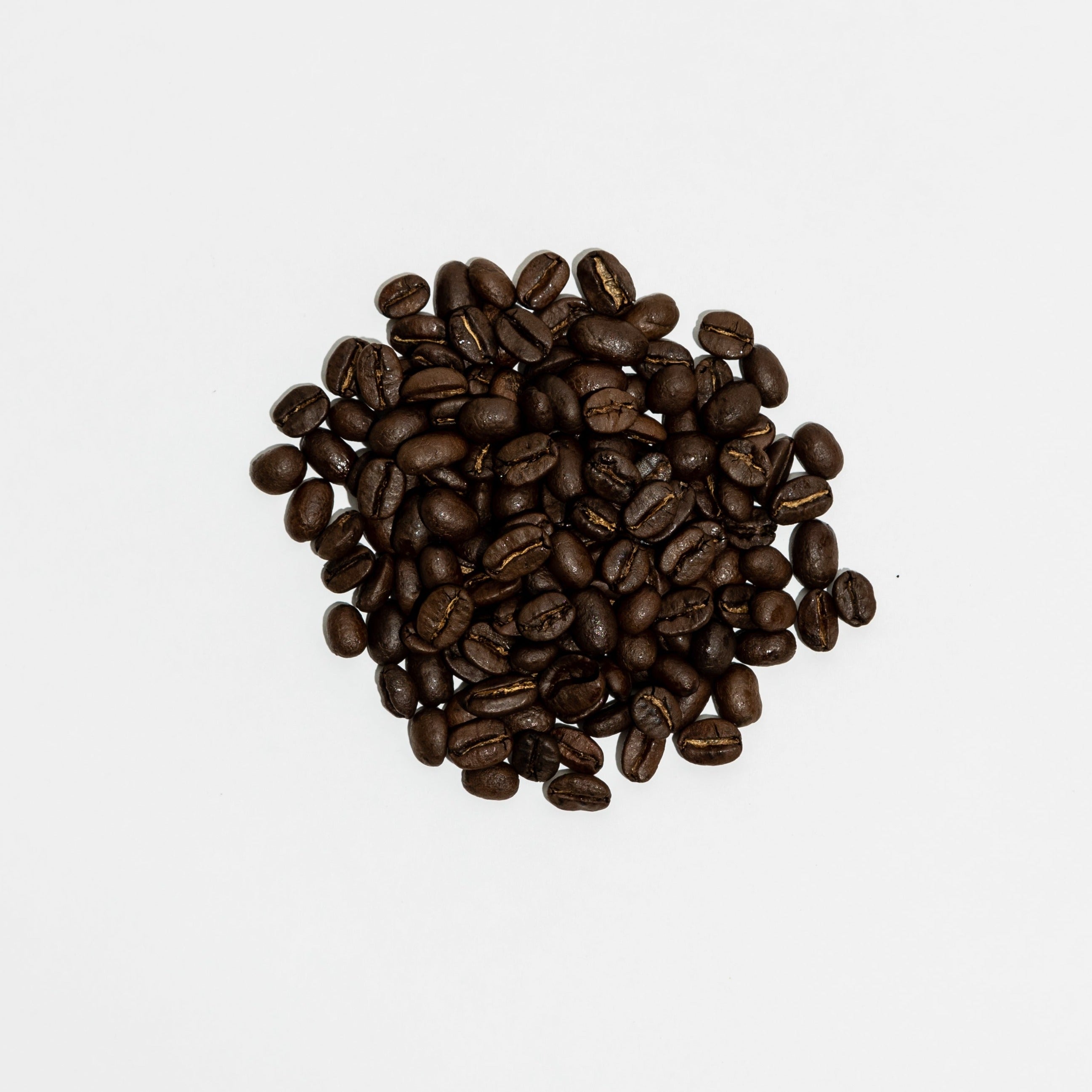 10 FOR TENN dark organic coffee beans with notes of honey, dark chocolate, and toasted pecan.