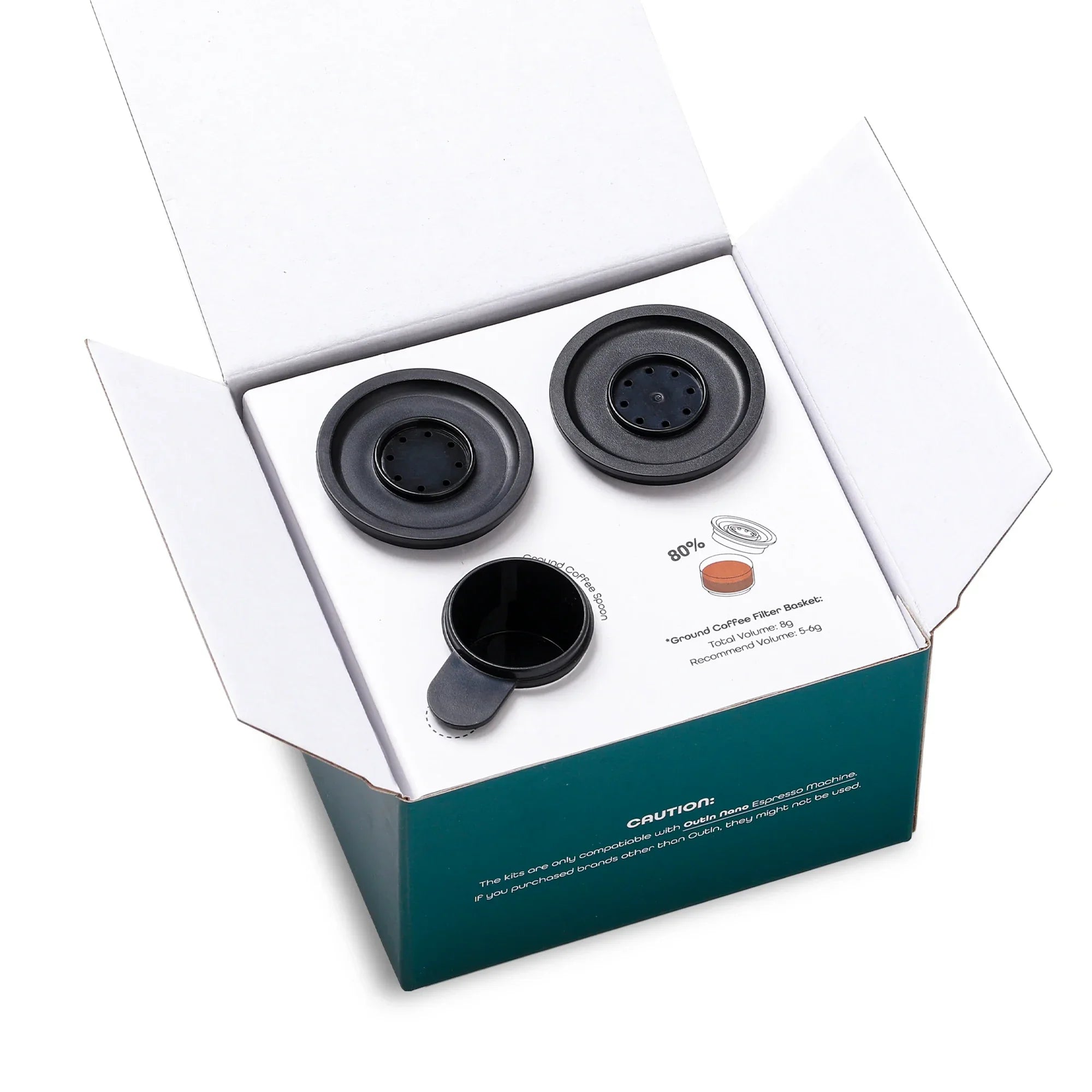 OutIn Nano Espresso Machine kit: five 5-6g ground coffee filter baskets and one coffee spoon in packaging.