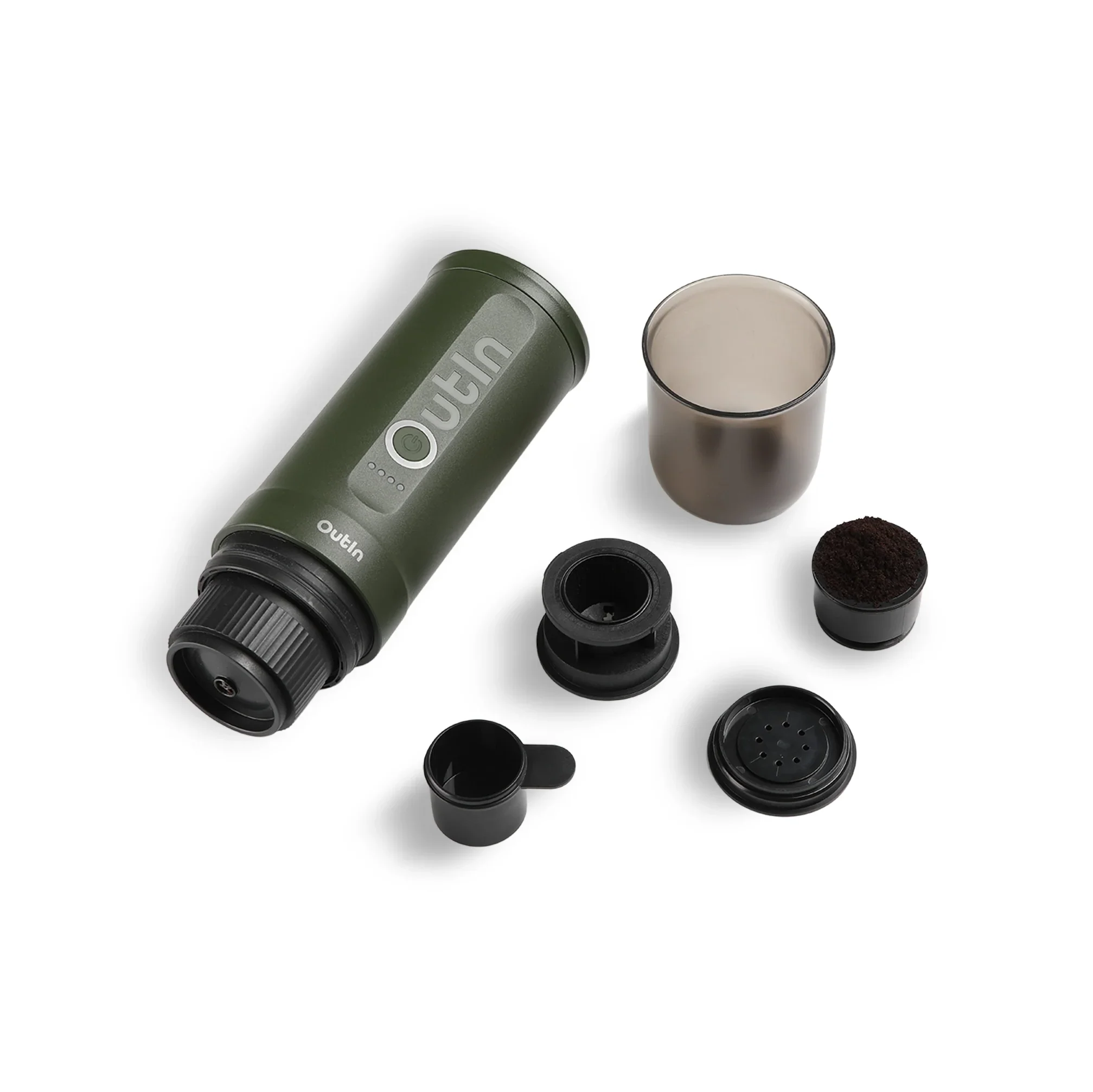 Forest green OutIn Nano portable espresso machine with accessories: scoop, grounds basket, capsule adapter, and cup.