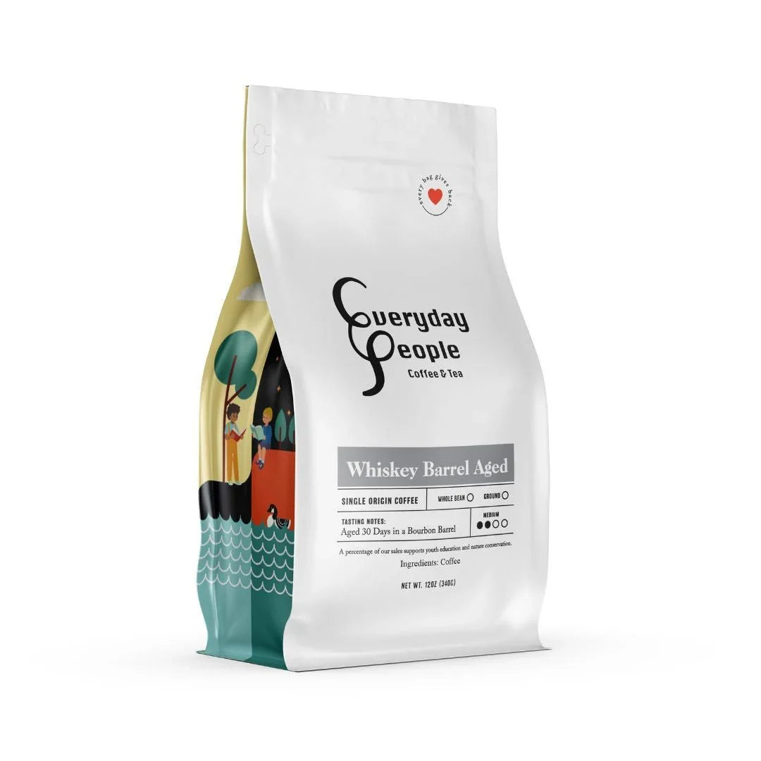 Everyday People Coffee & Tea Whiskey Barrel Aged Medium Roast bag, showing packaging with bourbon barrel aging details.